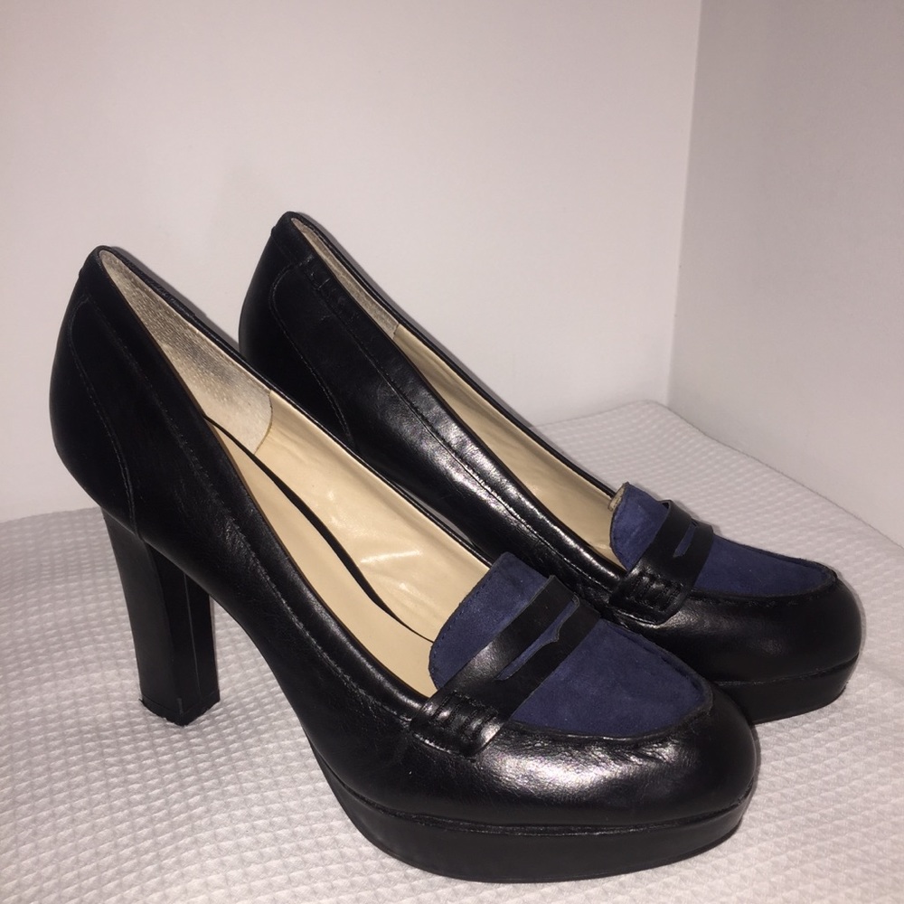 Nine West Black heels with suede tongue.